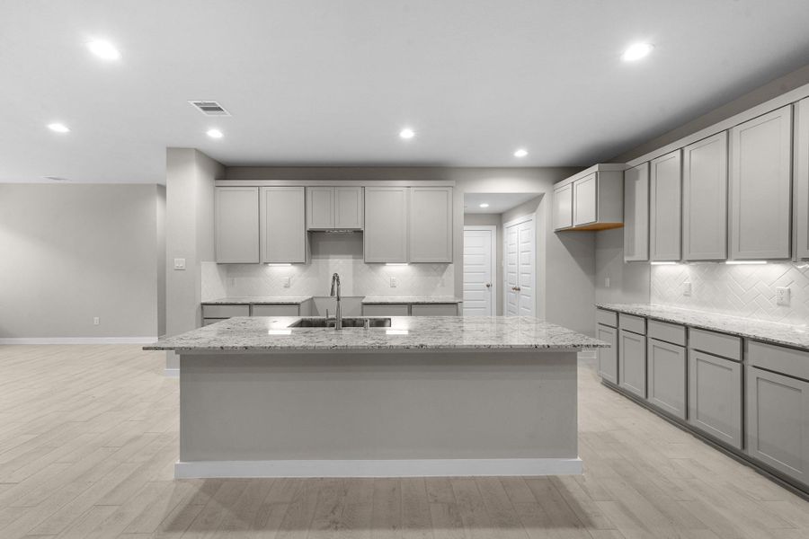 Furnished interior view inside a new home in Barton Creek Ranch, Conroe (Image 14).
