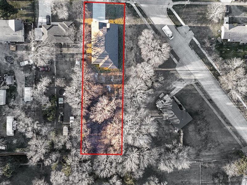 Aerial view of property's location with property boundaries highlighted Aerial view of property's location with property boundaries highlighted
