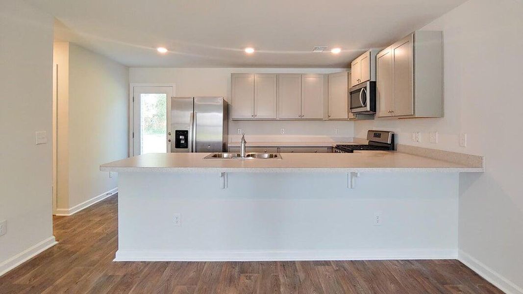 Furnished interior view inside a new home in Garbon Fields, Summerville (Image 11).