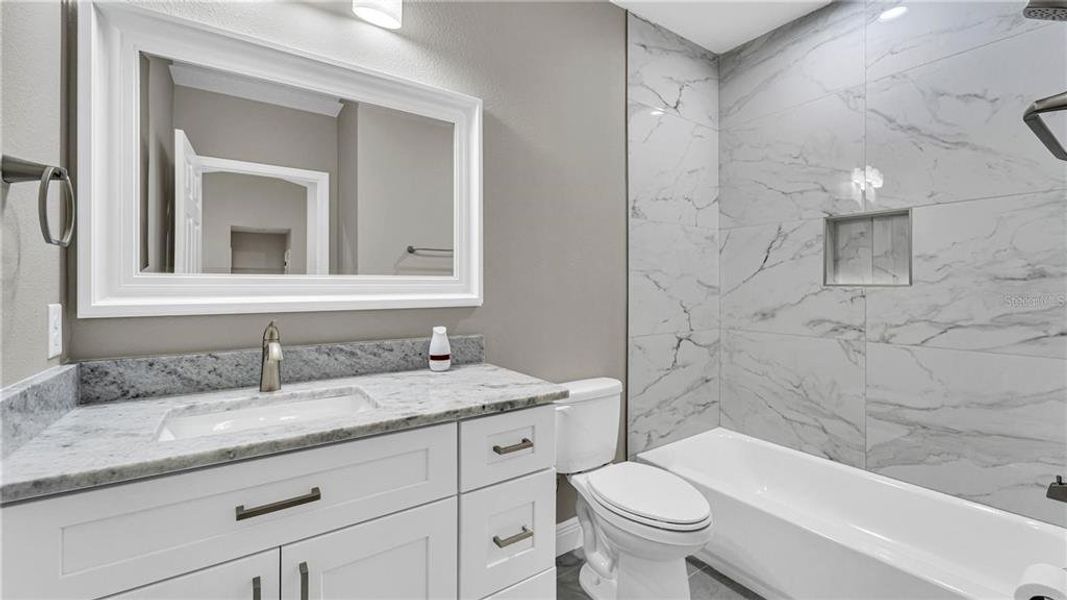 Furnished interior view inside a new home in , Deltona (Image 6).