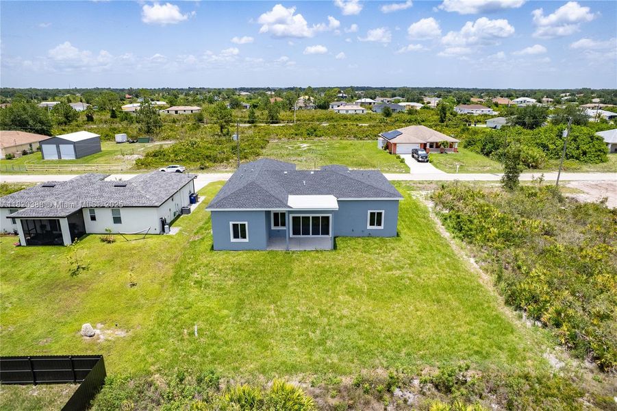 Exterior details and patio area of a home in , Lehigh Acres (Image 4). Exterior details and patio area of a home in , Lehigh Acres (Image 4).