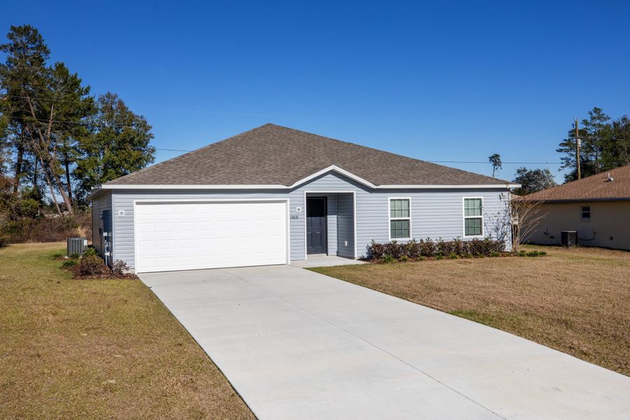 Representative exterior photo of a completed home built from the Orchid by Maronda Homes in Coastal Communities, Edgewater, FL (Image 25).