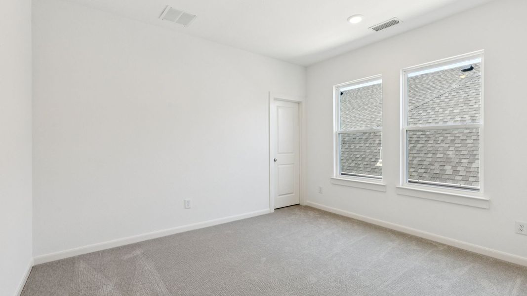 Representative unfurnished interior of a home built from the Tristan by Normandy Homes in Rainwater Crossing, Celina (Image 11).