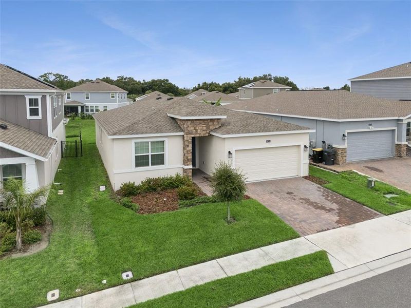 Front exterior of a new home in , Davenport, FL, highlighting curb appeal (Image 2). Front exterior of a new home in , Davenport, FL, highlighting curb appeal (Image 2).