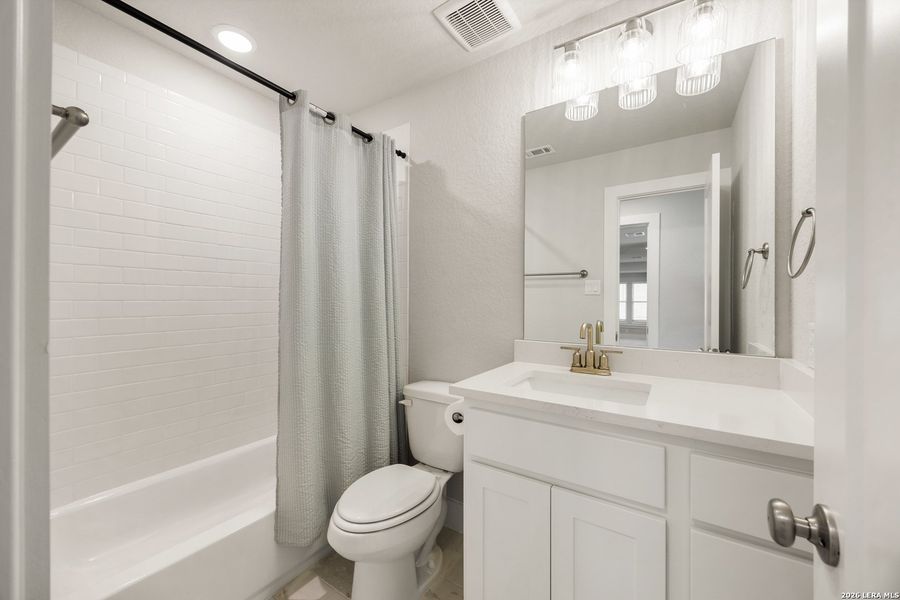 Furnished interior view inside a new home in Ventana, Bulverde (Image 20).