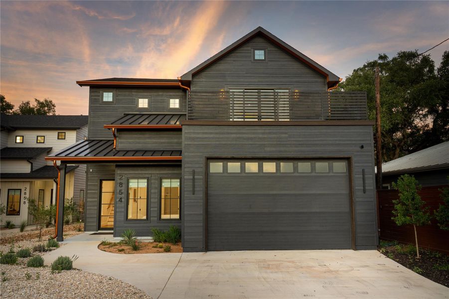 Modern Hill Country style meets warm curb appeal in this stunning Canyon Lake home. With clean lines, a spacious front patio, and an oversized garage, this home offers both striking design and everyday functionality just minutes from the lake.