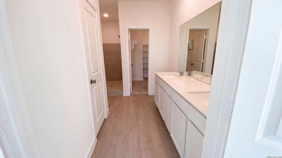 Furnished interior view inside a new home in Waterwheel, San Antonio (Image 9).