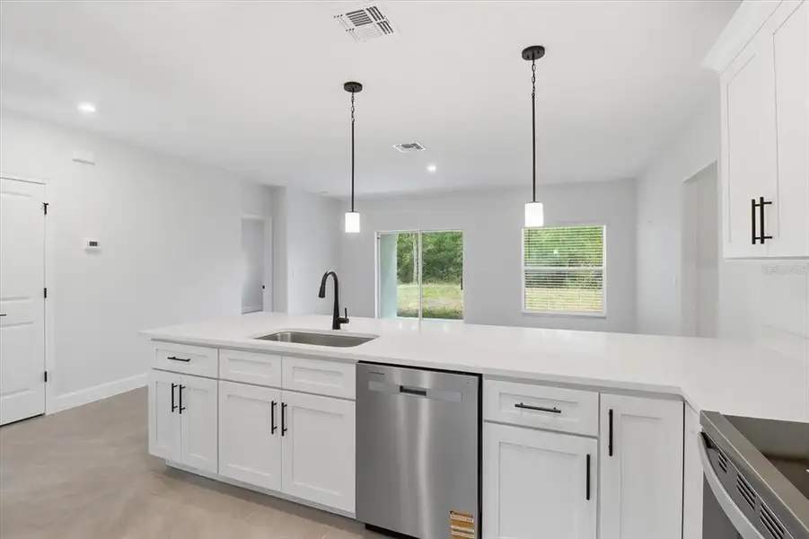Furnished interior view inside a new home in , Dunnellon (Image 6).