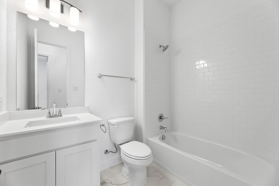Representative furnished interior of a home built from the Brookstone II by Sandlin Homes in Timberbrook, Justin (Image 16).