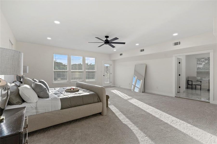 Carpeted bedroom with recessed lighting and ceiling fan Carpeted bedroom with recessed lighting and ceiling fan