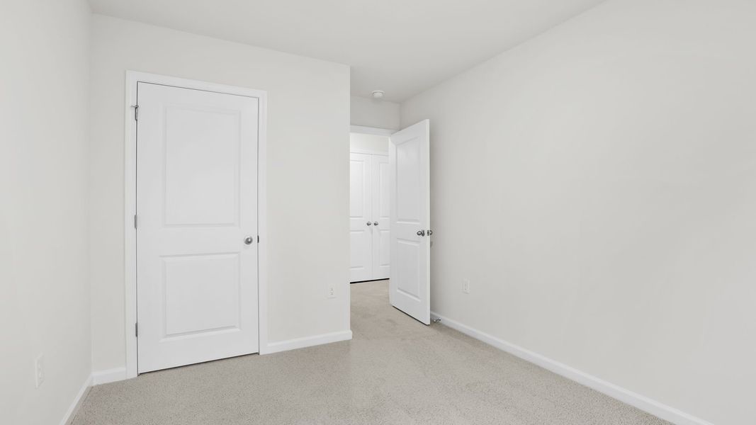 Spacious, unfurnished interior of a new home in Chestnut Ridge Townhomes, Greenville (Image 23).