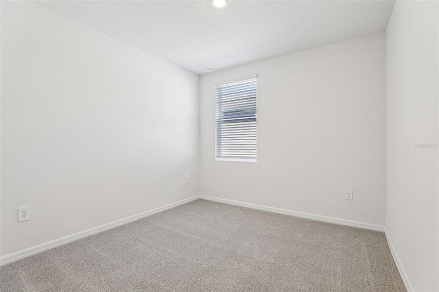 Spacious, unfurnished interior of a new home in Lake Deer Estates - Signature Series, Poinciana (Image 27).