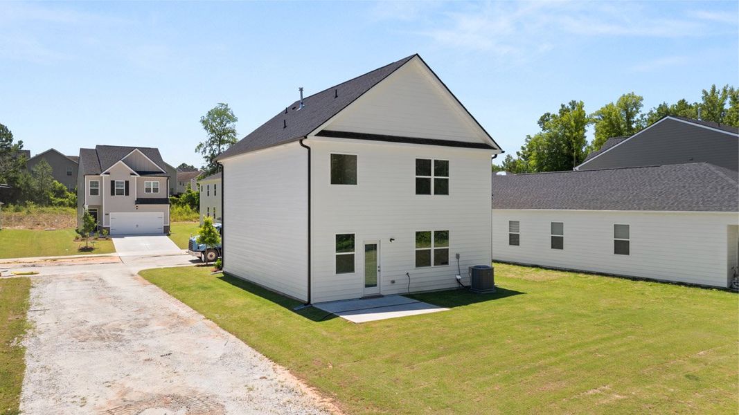 Front exterior of a new home in WillowBrook, Bethlehem, GA, highlighting curb appeal (Image 23). Front exterior of a new home in WillowBrook, Bethlehem, GA, highlighting curb appeal (Image 23).