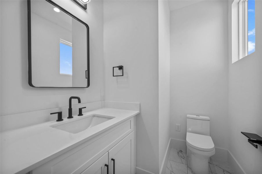 View of half bath by Game Room