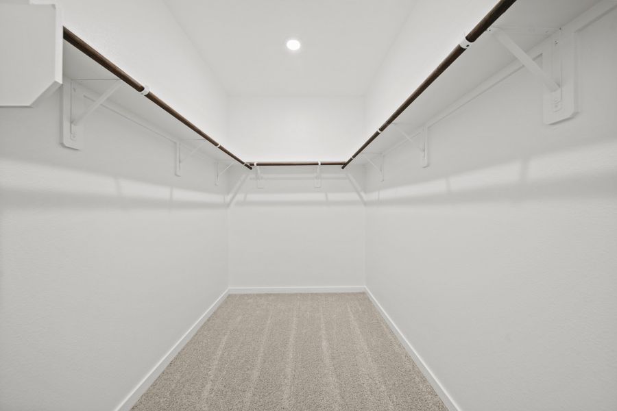 A hallway with white walls.