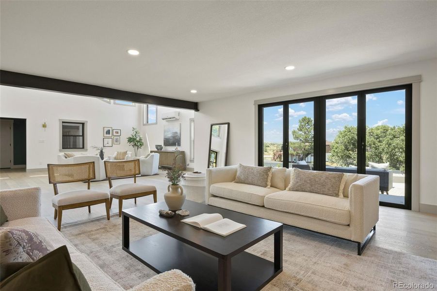 Living room with folding door to front patio