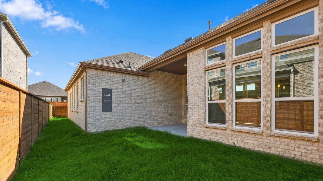 Exterior details and patio area of a home in Solterra Texas, Mesquite (Image 20).