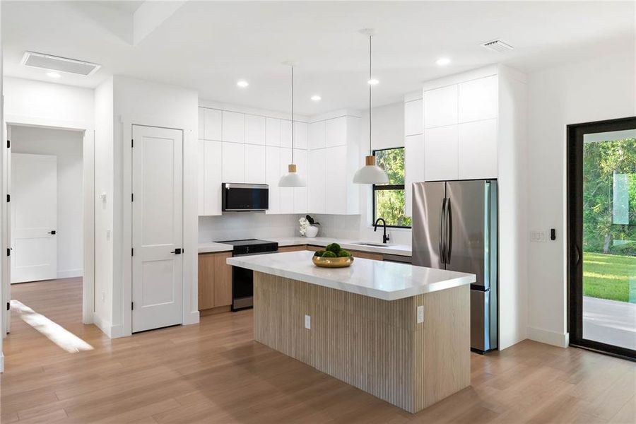 Furnished interior view inside a new home in , Port Charlotte (Image 14).