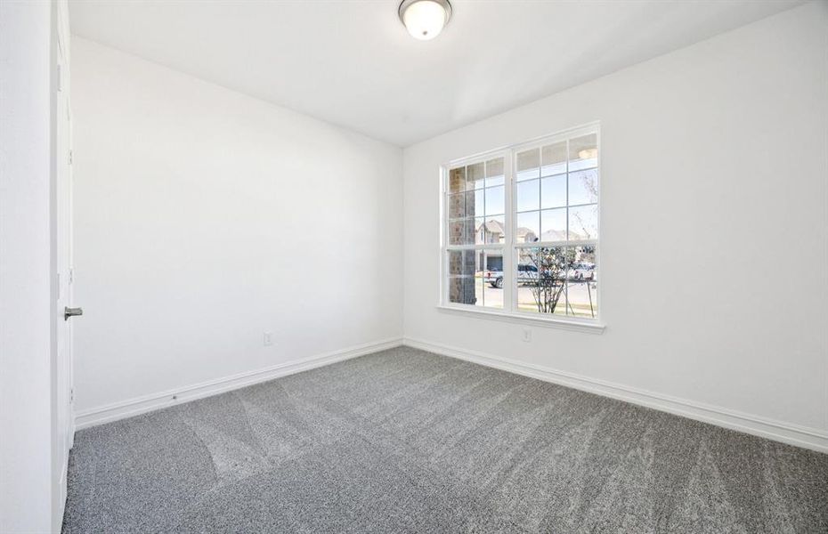 Secondary bedroom designed for comfort and convenience