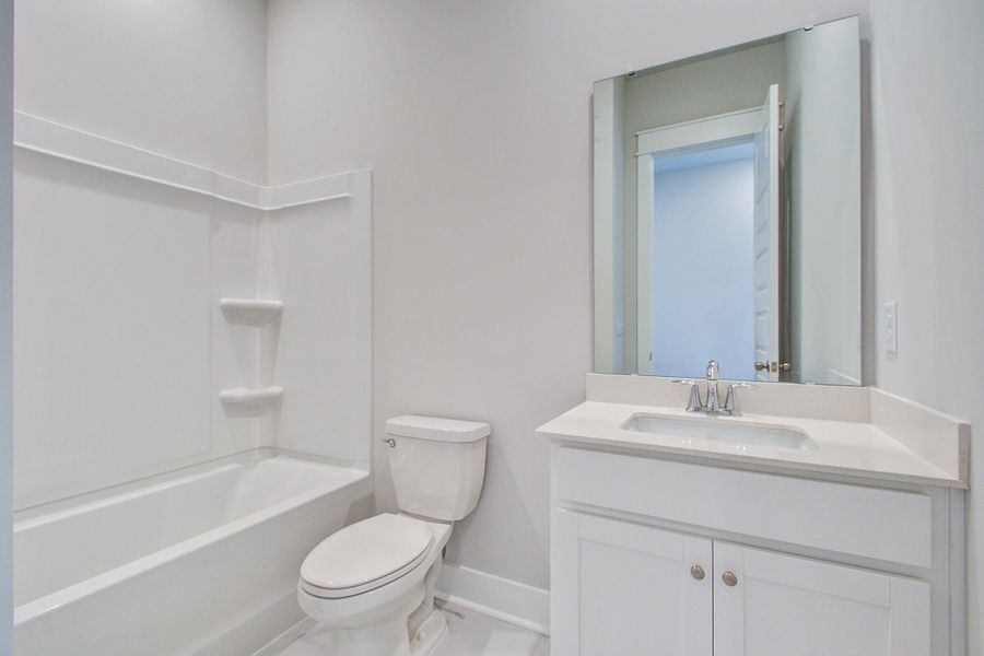 Furnished interior view inside a new home in Carnes Crossroads, Summerville (Image 6). Furnished interior view inside a new home in Carnes Crossroads, Summerville (Image 6).