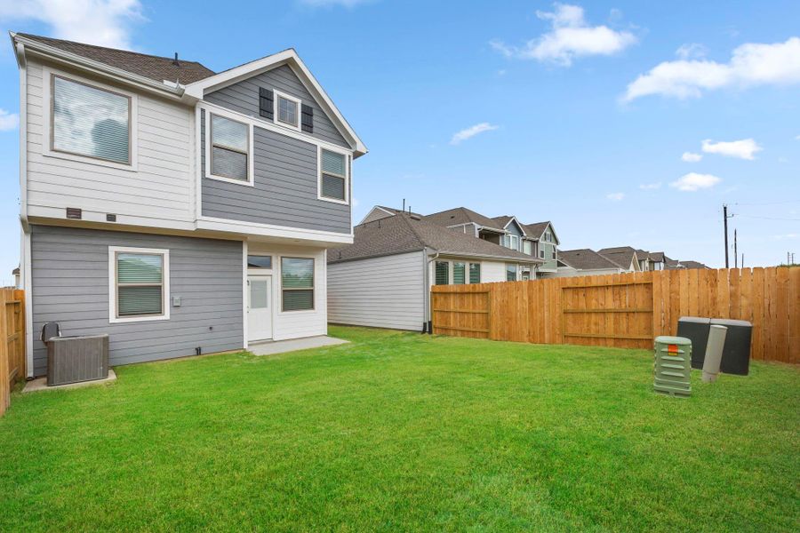 Exterior details and patio area of a home in Marvida, Cypress (Image 4).