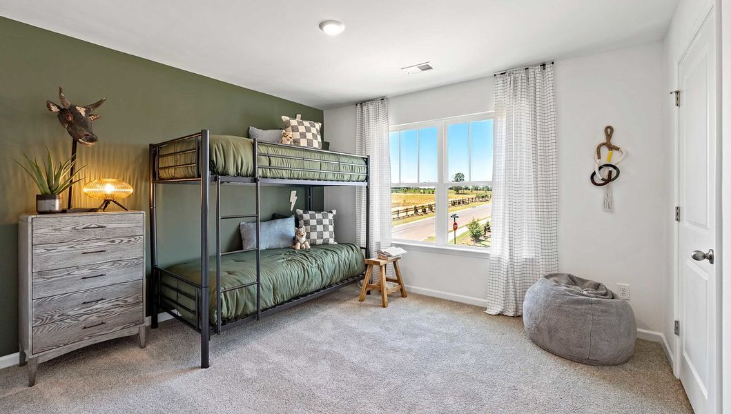 Furnished interior in a model home at Benjamin's Grove in Woodruff (Image 17).