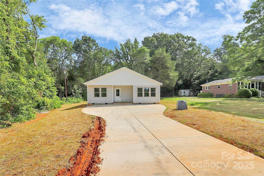 Front exterior of a new home in , Rock Hill, SC, highlighting curb appeal (Image 1).