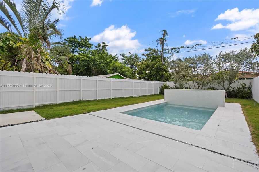 Front exterior of a new home in , Miami, FL, highlighting curb appeal (Image 10).