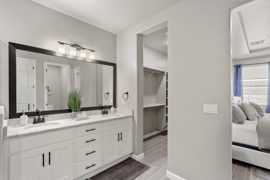 Representative furnished interior of a home built from the Pershing by Hakes Brothers in Paseo Del Este, El Paso (Image 25).