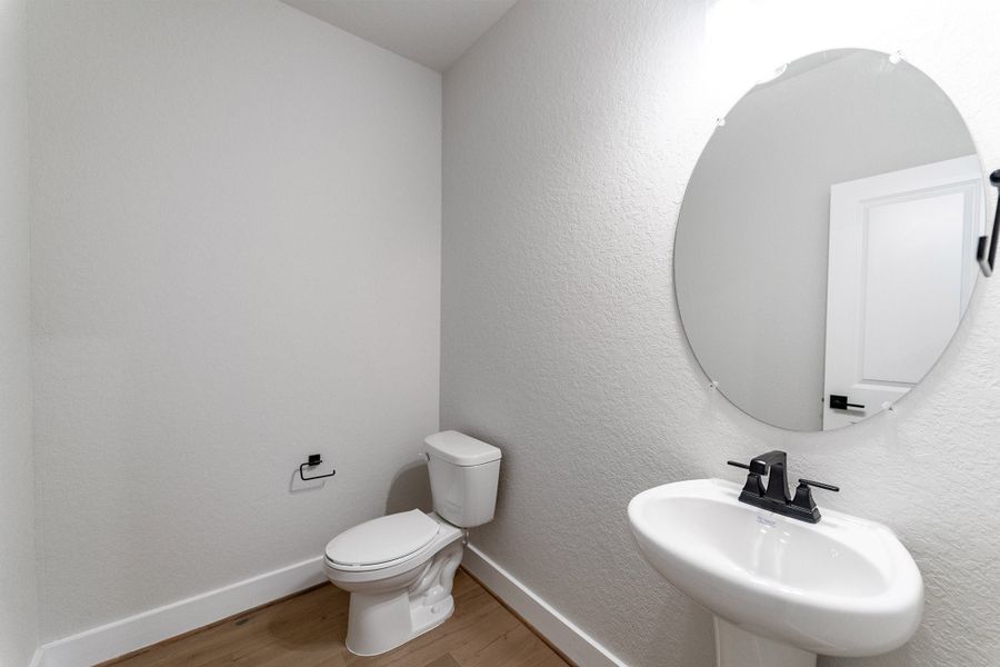 Furnished interior view inside a new home in The Woodlands at Medina Hills, Mico (Image 12).