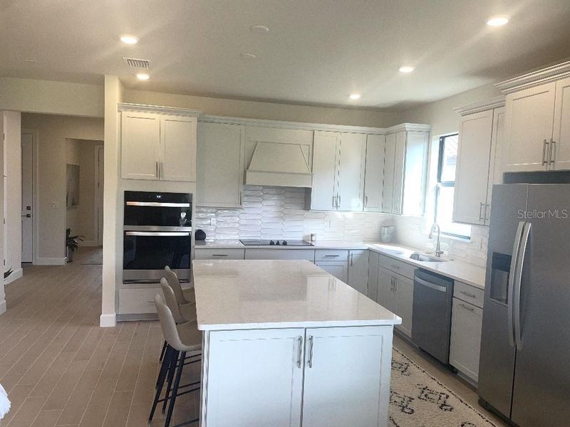 Furnished interior view inside a new home in Preserve at Waterway Village, Vero Beach (Image 14).