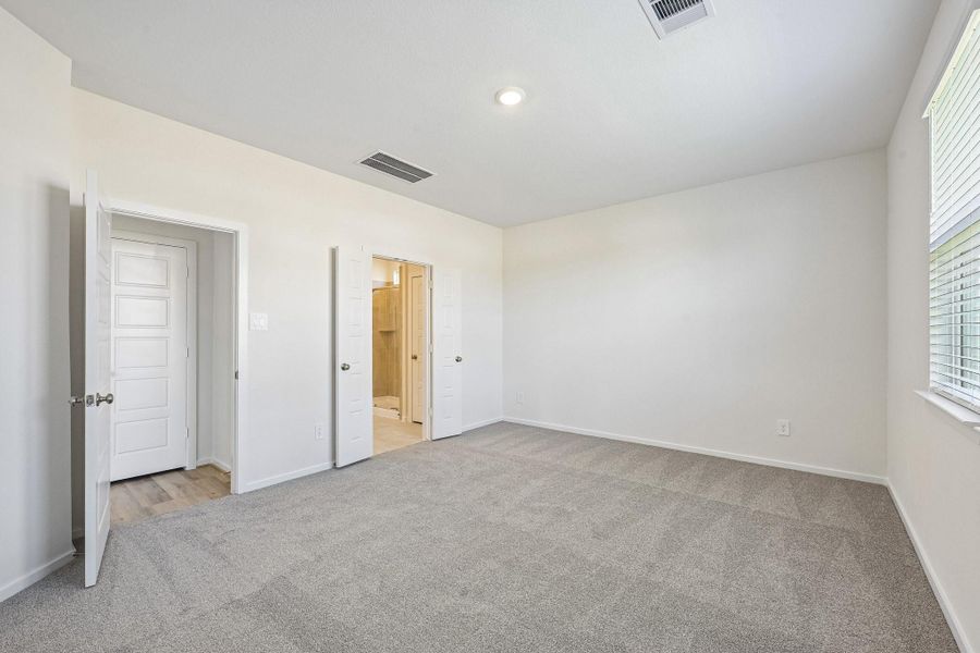 Spacious, unfurnished interior of a new home in Riviera Pines - Traditional Series, Huffman (Image 21).