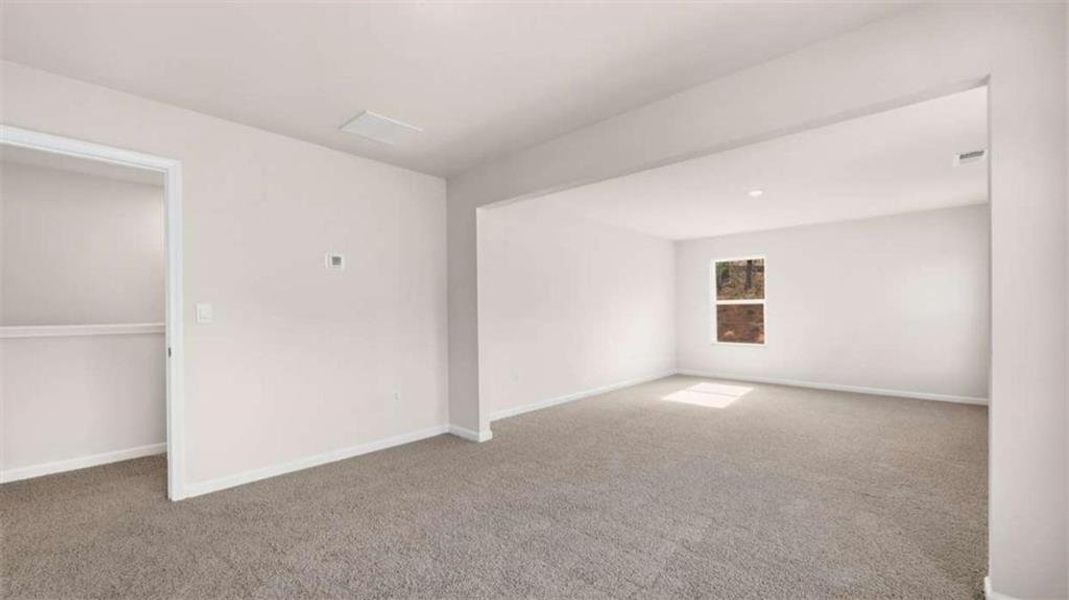 Spacious, unfurnished interior of a new home in Brooks Station, Dacula (Image 26).