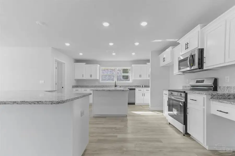 Representative furnished interior of a home built from the 2751 by Adams Homes in Pecan Valley, Cantonment (Image 5).