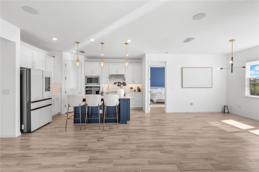 Furnished interior view inside a new home in EverBe, Orlando (Image 11).