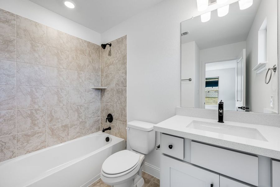 Representative furnished interior of a home built from the Camelia by Taylor Morrison in Stoneridge, Melissa (Image 15).