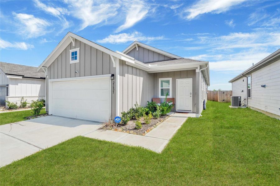 Front exterior of a new home in , Hockley, TX, highlighting curb appeal (Image 2). Front exterior of a new home in , Hockley, TX, highlighting curb appeal (Image 2).