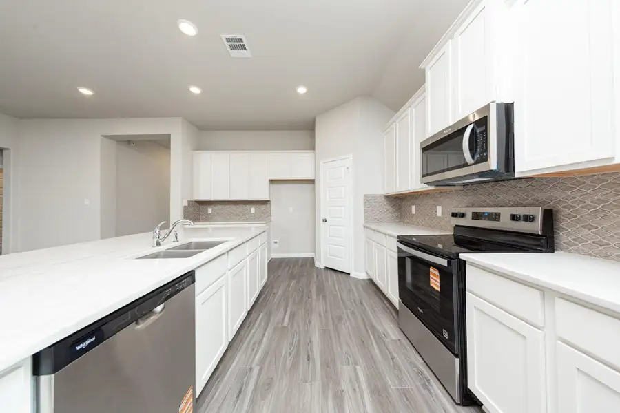 Furnished interior view inside a new home in Lake Conroe Area Homes, Montgomery (Image 5). Furnished interior view inside a new home in Lake Conroe Area Homes, Montgomery (Image 5).