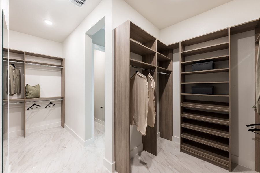 Representative furnished interior of a home built from the Camden by Tri Pointe Homes in Bridgeland, Cypress (Image 38).