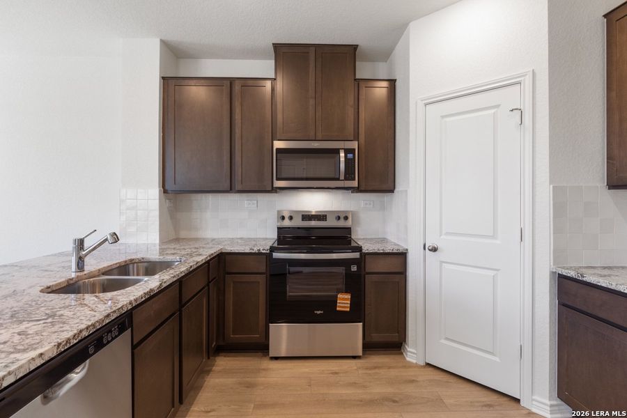 Furnished interior view inside a new home in Knox Ridge, Converse (Image 14).