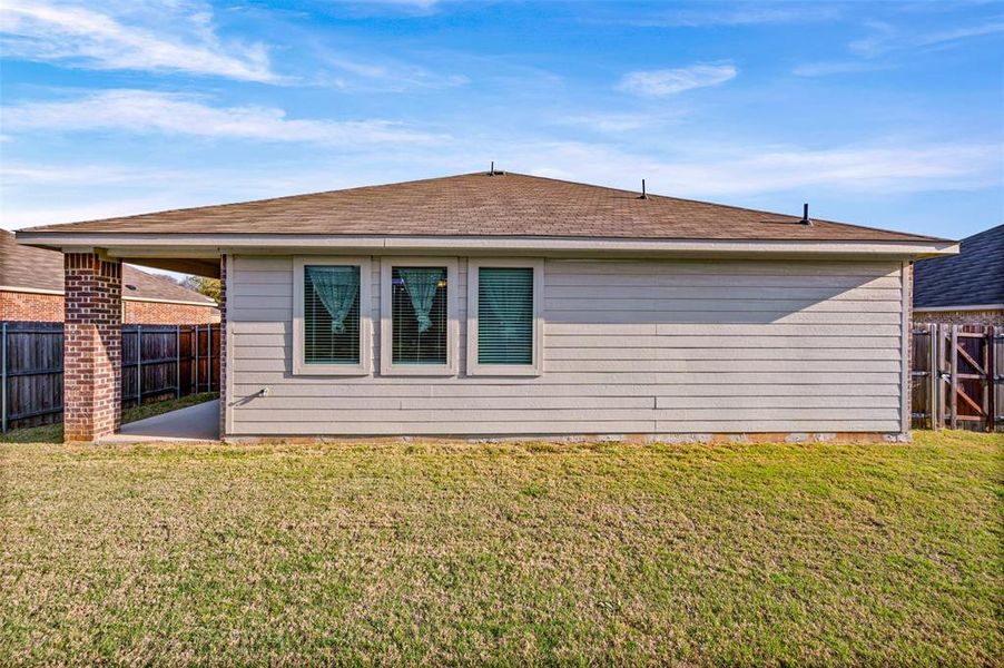 Exterior details and patio area of a home in Azle Grove, Azle (Image 27).