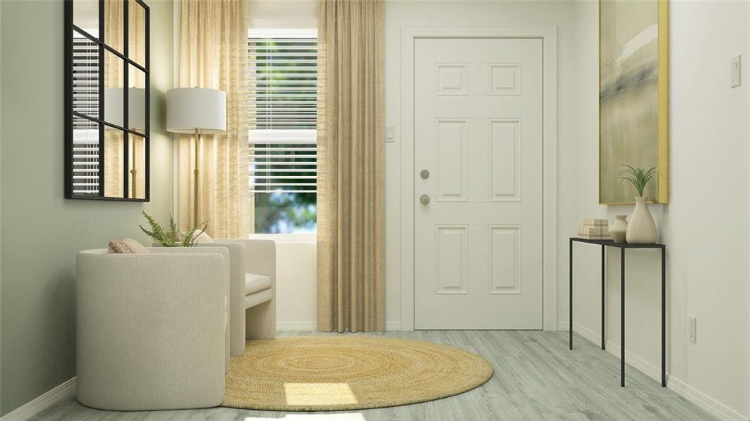 Foyer entrance with healthy amount of natural light and wood finished floors Foyer entrance with healthy amount of natural light and wood finished floors