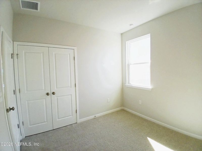 Spacious, unfurnished interior of a new home in Seminole Palms, Palm Coast (Image 15).