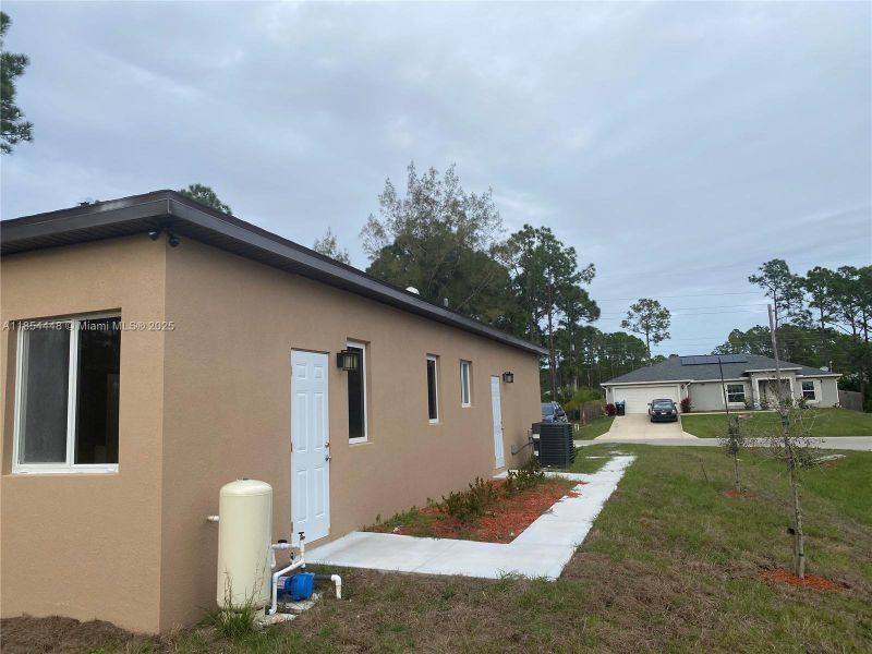 Exterior details and patio area of a home in , Palm Bay (Image 3). Exterior details and patio area of a home in , Palm Bay (Image 3).