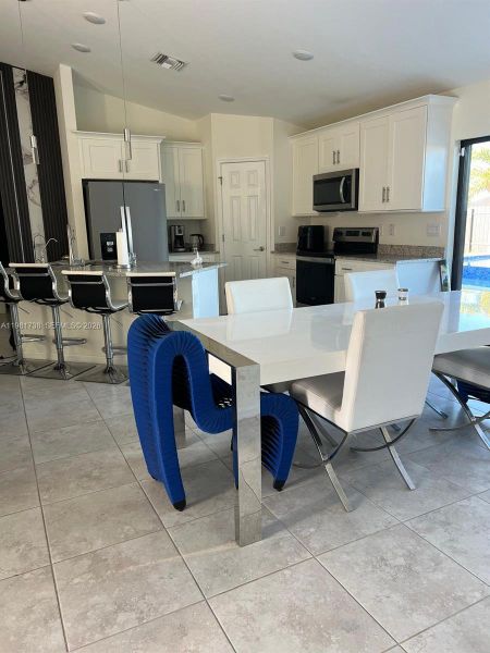 Furnished interior view inside a new home in , Cape Coral (Image 3). Furnished interior view inside a new home in , Cape Coral (Image 3).