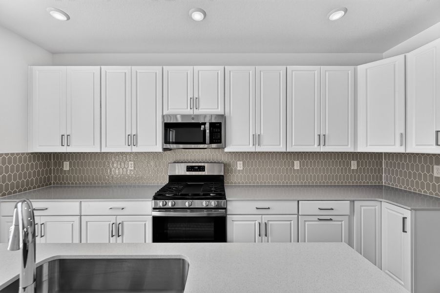 Furnished interior view inside a new home in Trailstone, Arvada (Image 6).