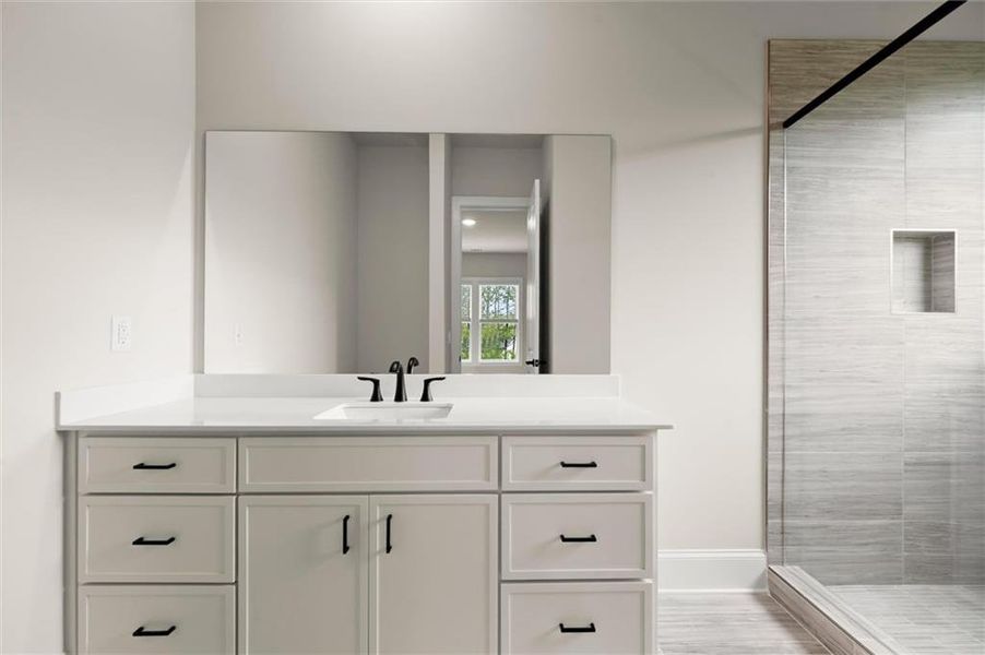 Furnished interior view inside a new home in , Flowery Branch (Image 11). Furnished interior view inside a new home in , Flowery Branch (Image 11).