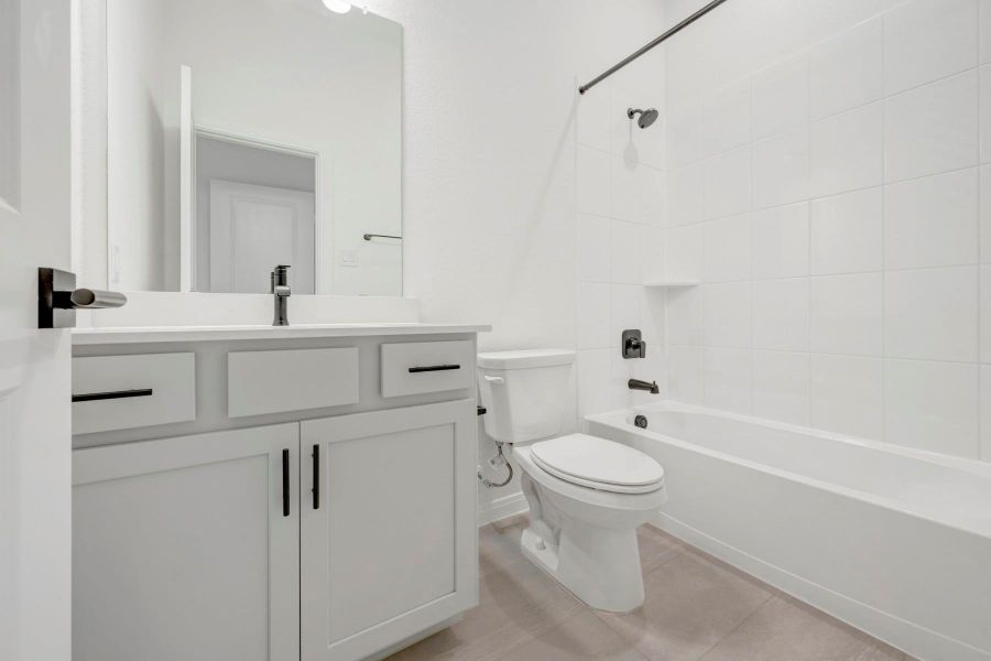 Furnished interior view inside a new home in The Grand Prairie 50’, Hockley (Image 14).