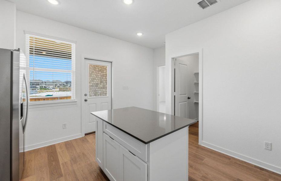 Furnished interior view inside a new home in Crosswinds, Kyle (Image 13).