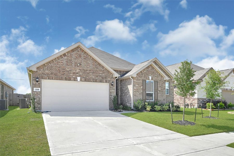 Front exterior of a new home in Lakewood Pines Preserve, Houston, TX, highlighting curb appeal (Image 2). Front exterior of a new home in Lakewood Pines Preserve, Houston, TX, highlighting curb appeal (Image 2).